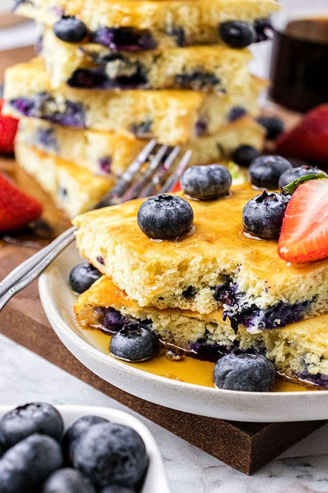 Easy oven baked pancakes with blueberries on a plate
