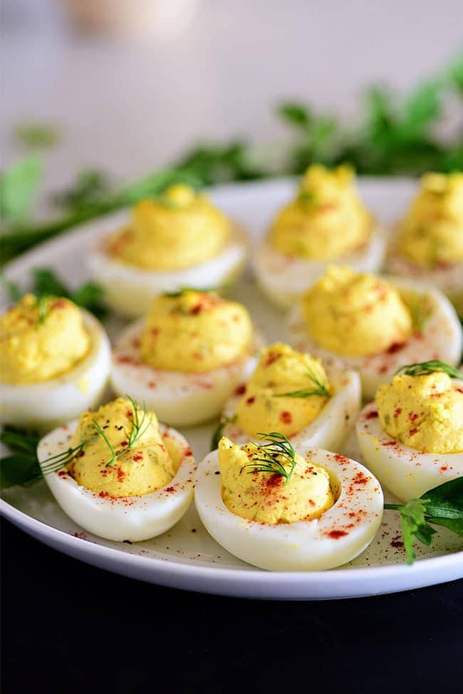 https://tidymom.net/blog/wp-content/uploads/2022/03/deviled-eggs-photograph.jpg