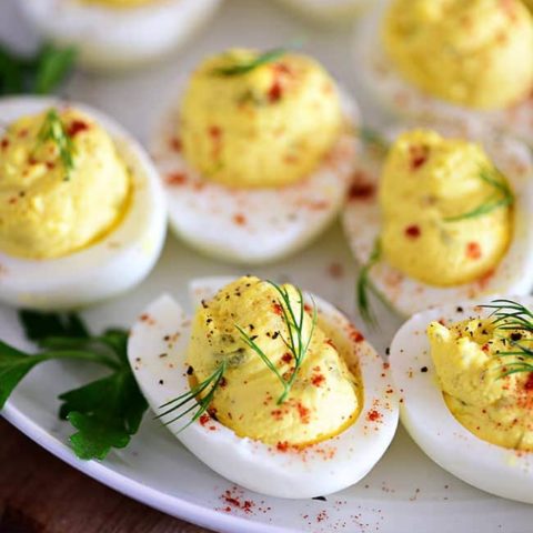 Easy deviled eggs on a white plate