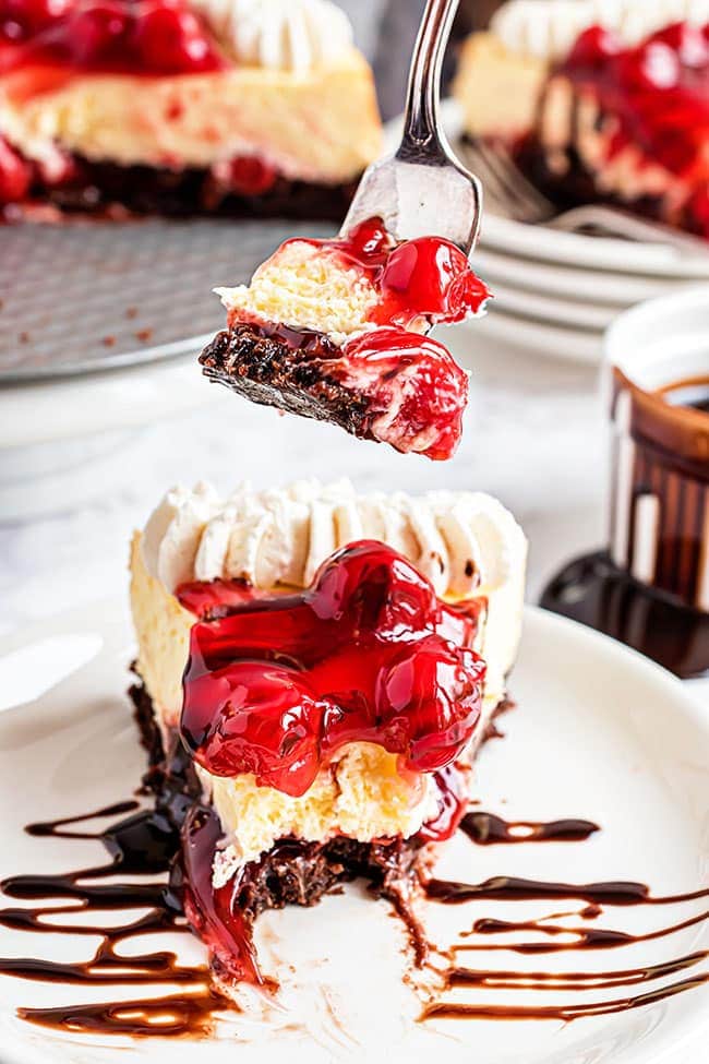 bite of Brownie cherry cheesecake on a fork