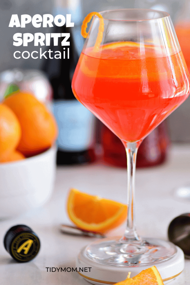 Aperol Spritz cocktail in a wine glass with fresh orange slices