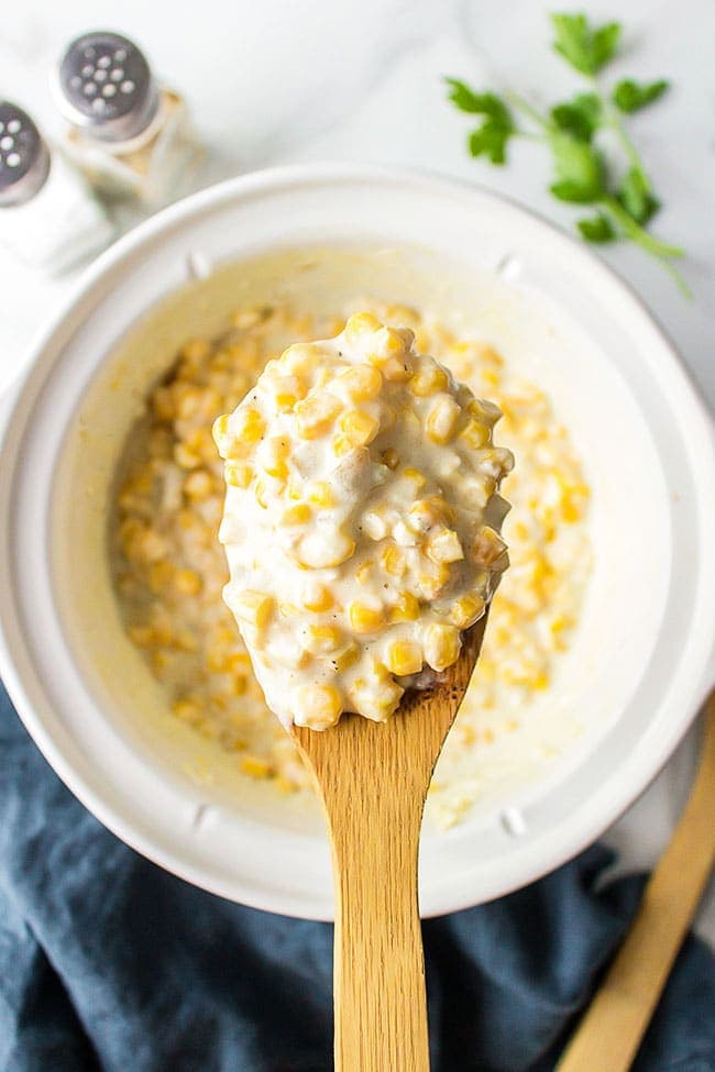 Spoonful of Cream Cheese Corn over a crockpot