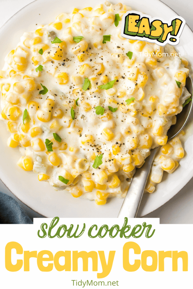 Easy Creaed Corn Recipe on a white plate with a spoon