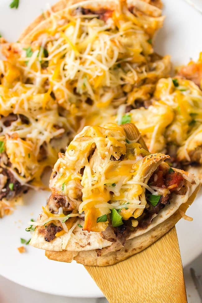 Black Bean Mexican Pizza on a spatula