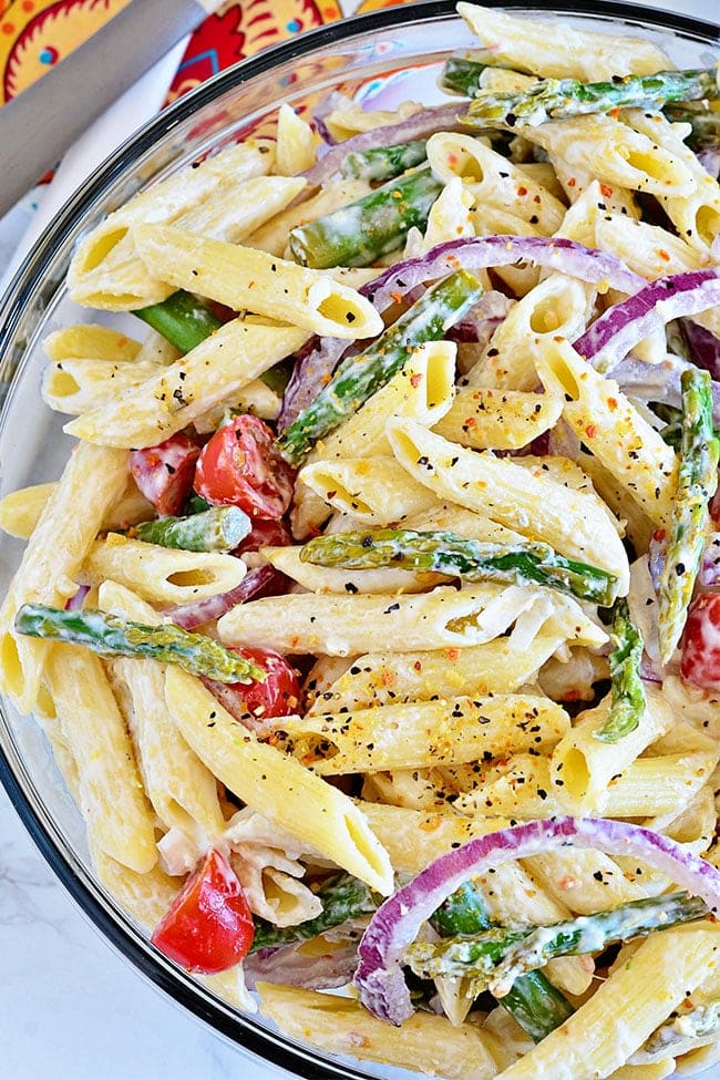 a bowl of asparagus pasta salad