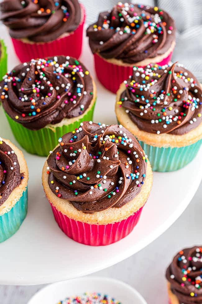 Easy Homemade Vanilla Cupcakes with chocolate frosting and sprinkles