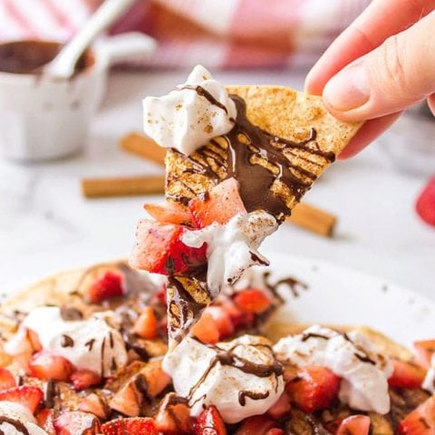 Chocolate Dessert Nachos with fresh strawberries and homemade baked cinnamon tortilla chips