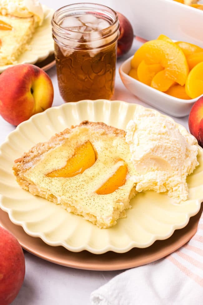 Warm peach kuchen with ice cream