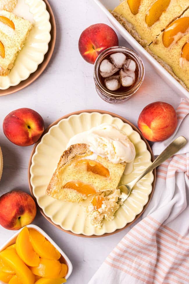 Warm, plated peach kuchen with ice cream