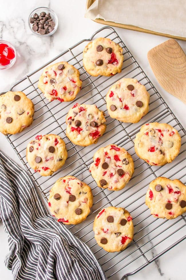 Maraschino Cherry cookie with chocolate chips on a cooling rack