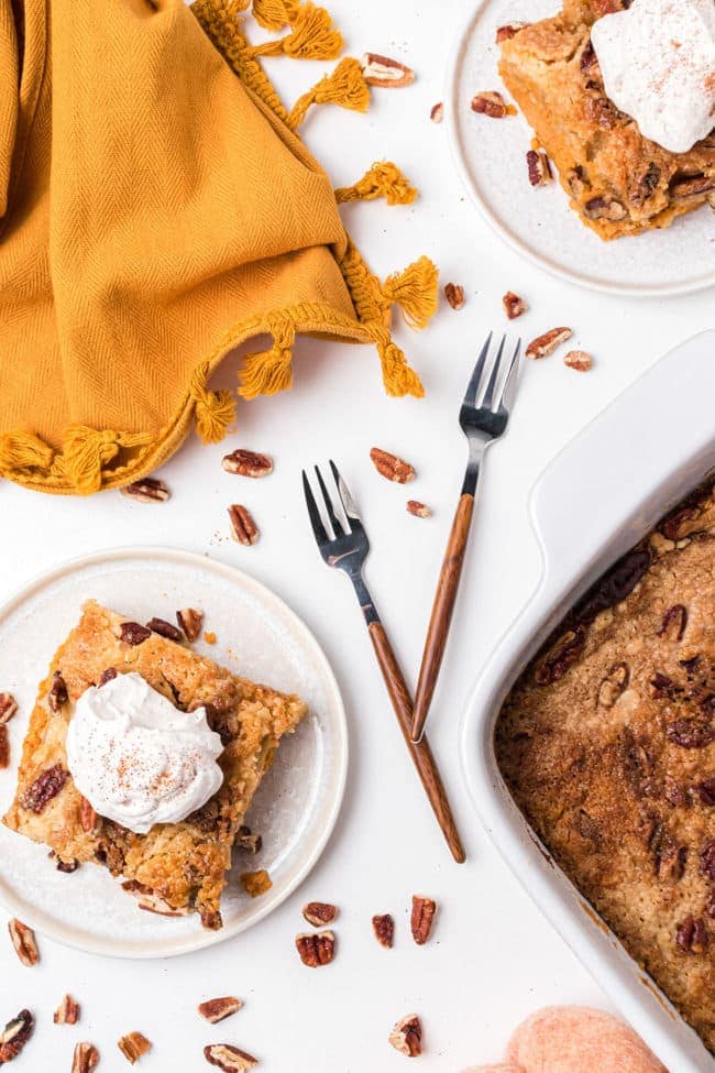 Easy pumpkin dessert on a table with chopped pecans