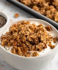 Snickerdoodle healthy granola recipe in a bowl with yogurt