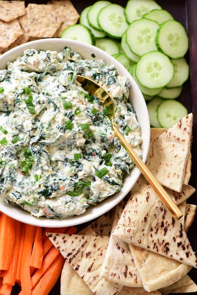 No-bake Creamy Knorr spinach dip on a tray with veggies