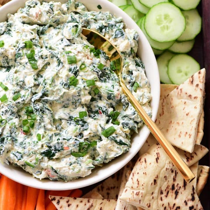 No-bake Creamy Knorr spinach dip on a tray with veggies