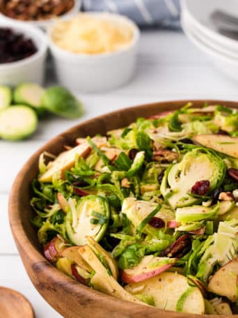 Wood bowl with shredded Brussels Sprouts Salad