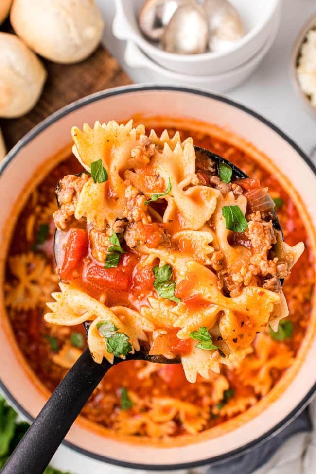 Ladle over a pot filled with lasagna soup