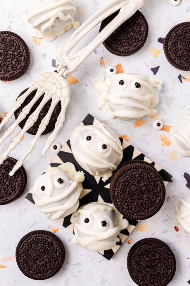 Easy halloween mummy oreo truffles with a skeleton hand