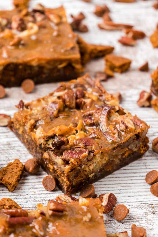 pumpkin 7-layer bars on a counter with cinnamon chips