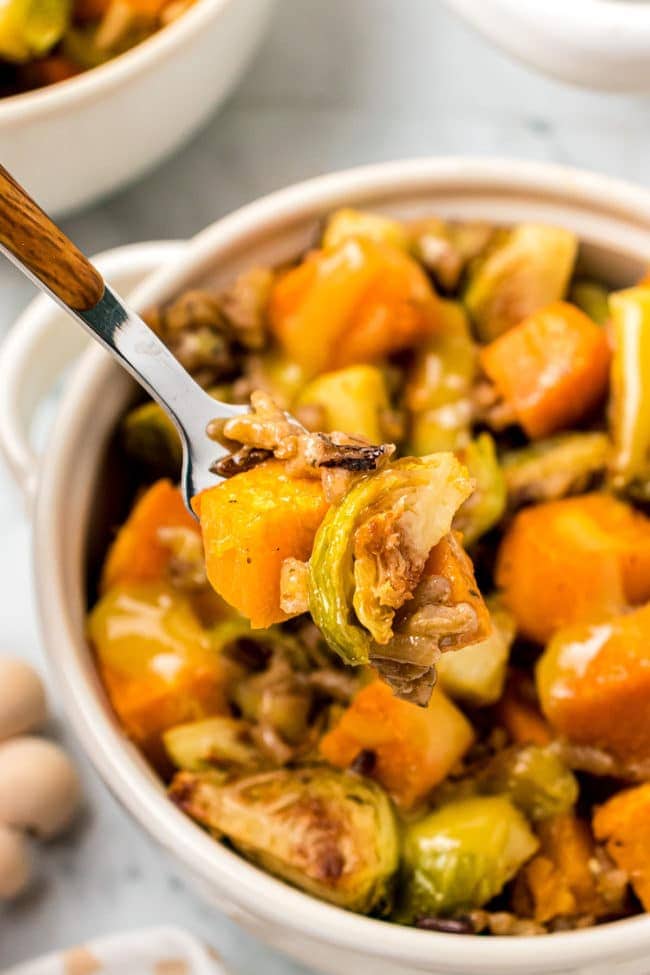 Roasted Brussels Sprouts And Sweet Potatoes With Wild Rice on a fork