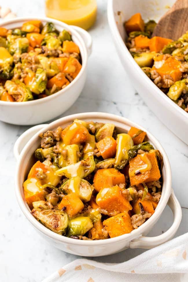 2 bowls of Roasted Brussels Sprouts And Sweet Potatoes With with rice