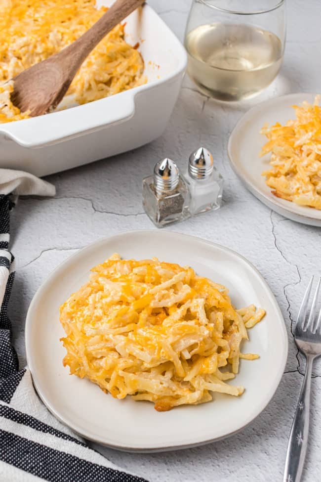 two plates with hashbrown casserole