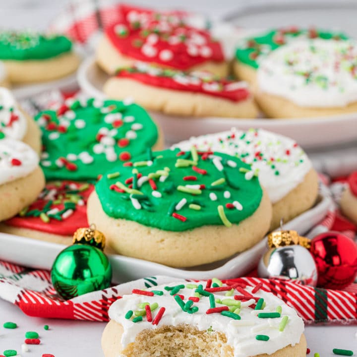 holiday cookies on a counter - one cookie with a bite out!