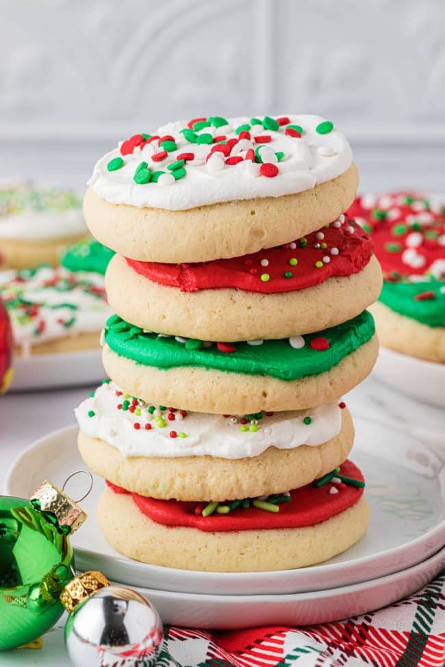 a stack of Christmas frosted sugar cookies