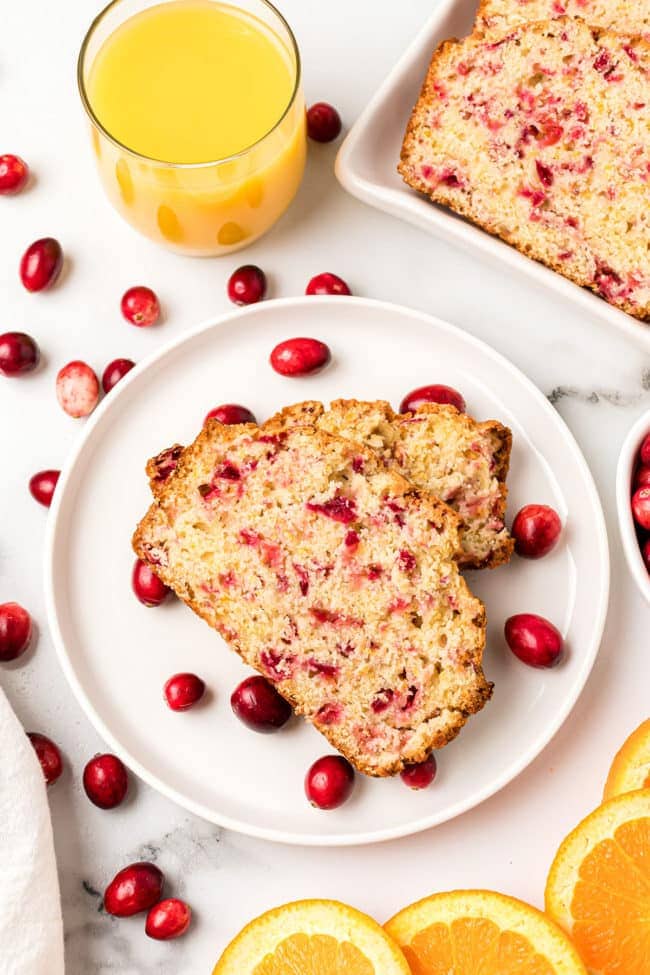 Sliced cranberry orange bread on a plate