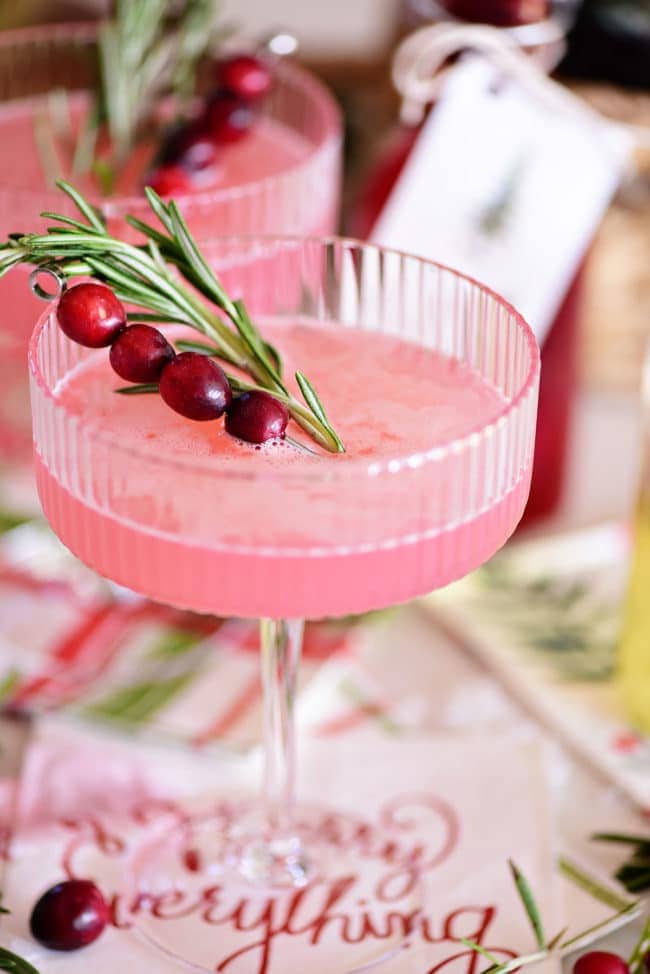 close up of handcrafted pink cranberry cosmo cocktail