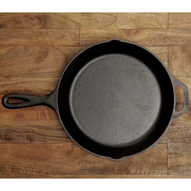 cast iron skillet on a wood table