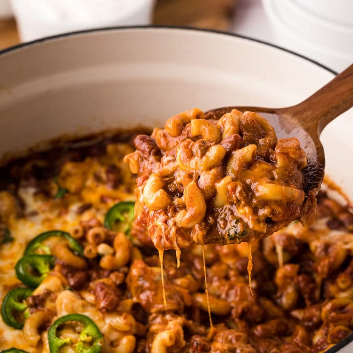 dutch oven filled with cheesy chili mac