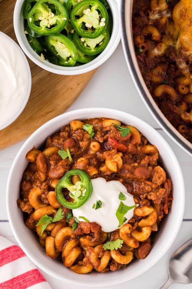 chili in a bowl topped with sour cream