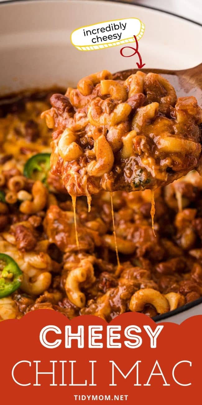 close up of a wooden spoon full of cheesy chili