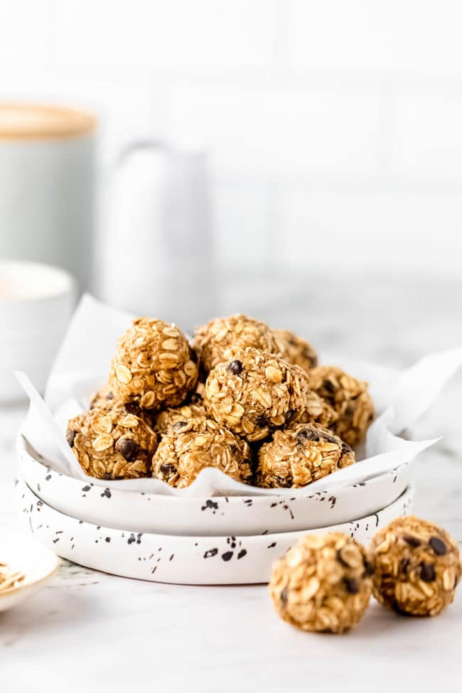 peanut butter and chocolate chip bliss balls on a table