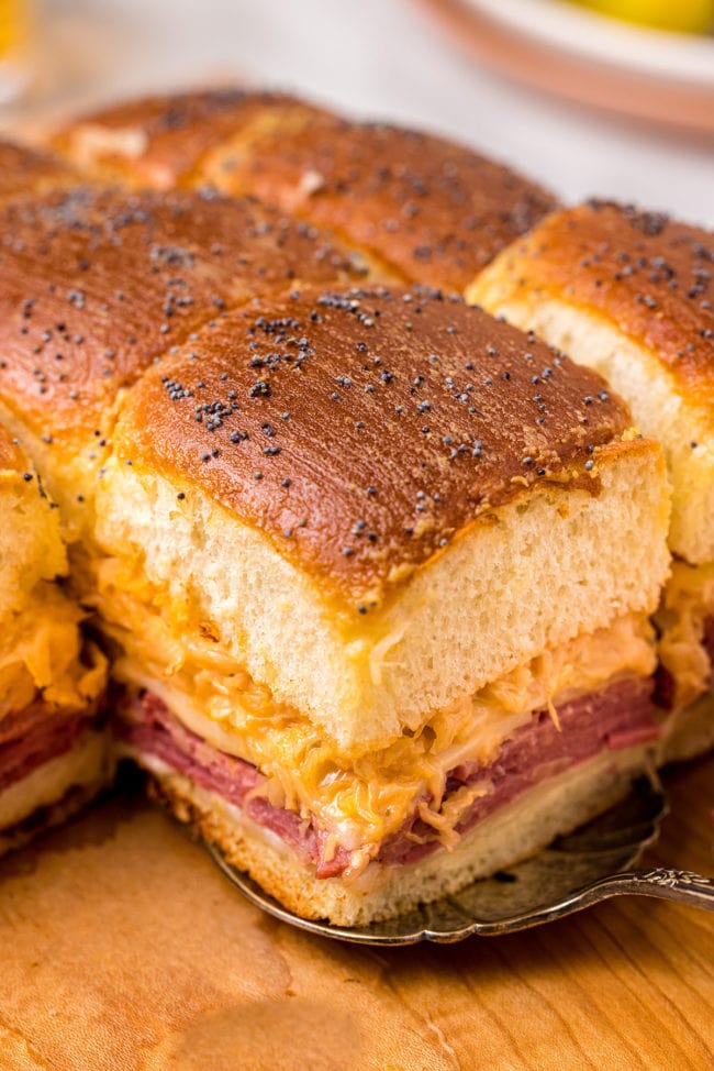 a pan of baked reuben sliders