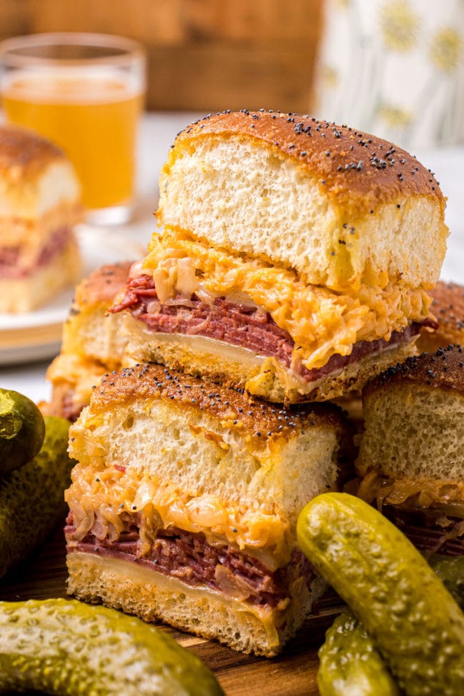 a stack of baked slider sandwiches