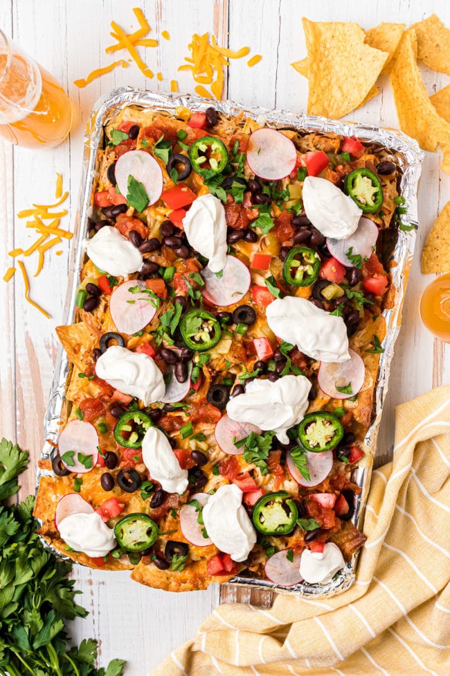 oven baked nacho on a sheet pan with foil