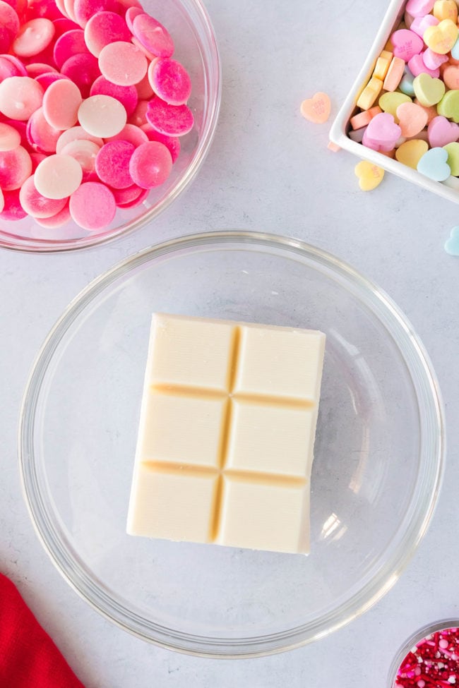 a block of almond bark in a glass bowl