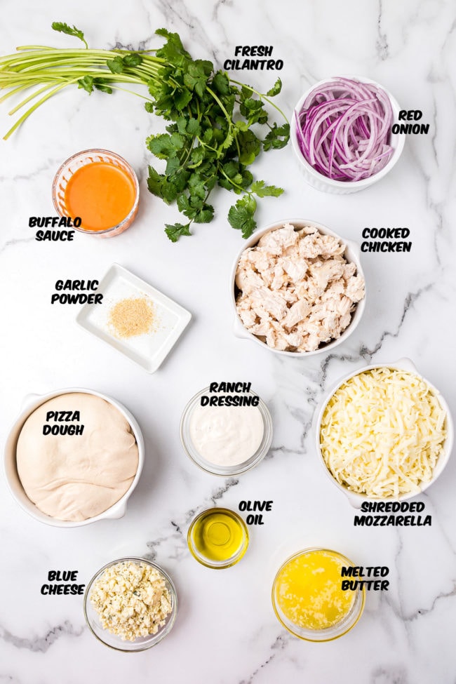 ingredients to make a delicious homemade buffalo chicken pizza