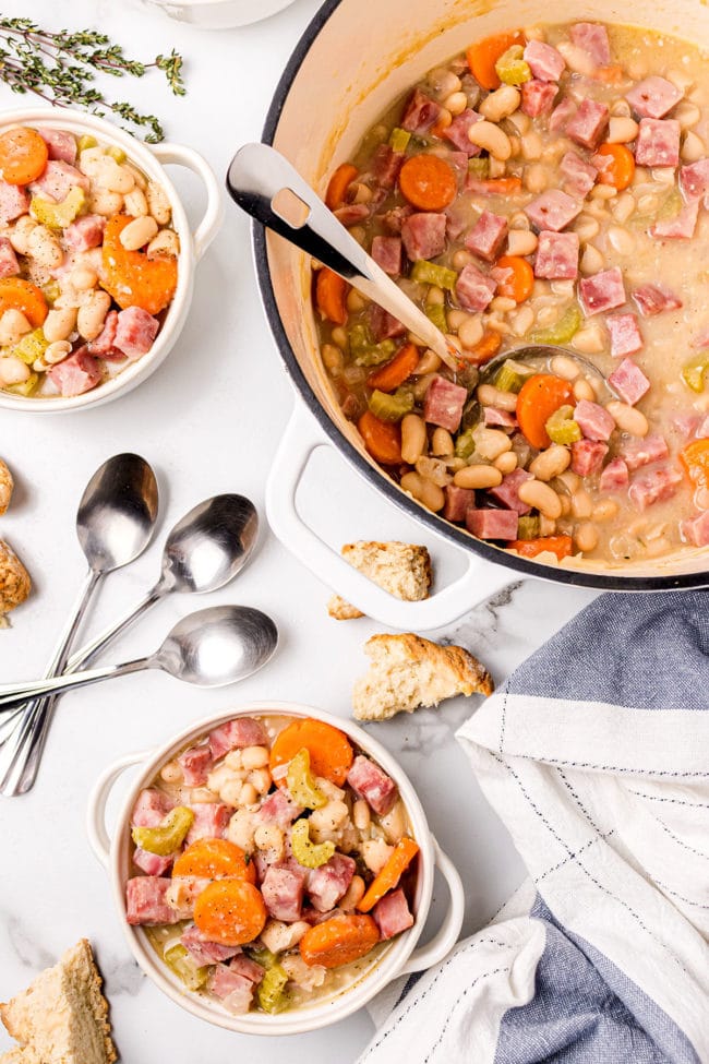 Comforting bowl of ham and bean soup served in a dutch oven