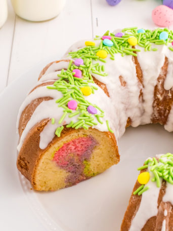 cut bundt cake with colorful swirls inside