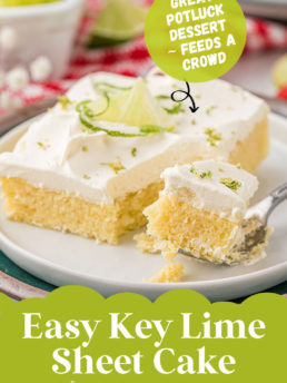 key lime cake on a plate with a fork