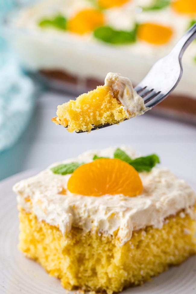 orange cake with bite on a fork