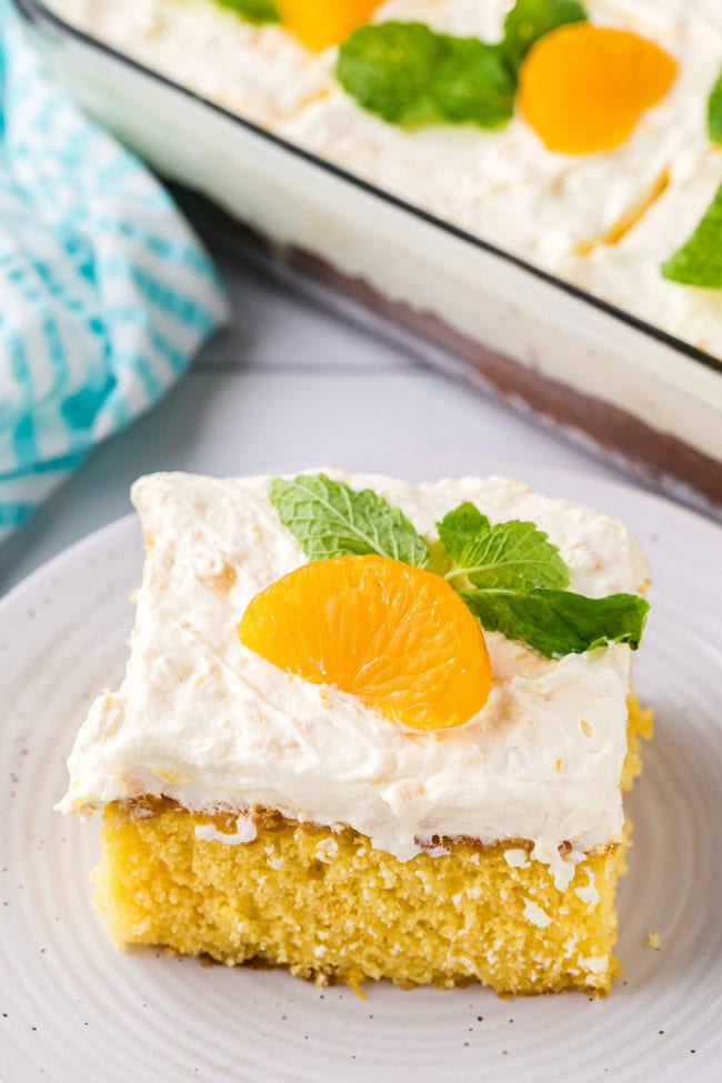 orange cake serving with pineapple frosting