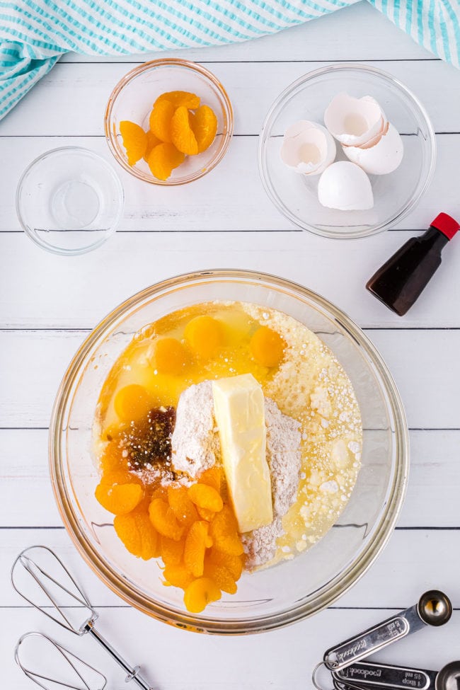 orange cake ingredients in glass bowl