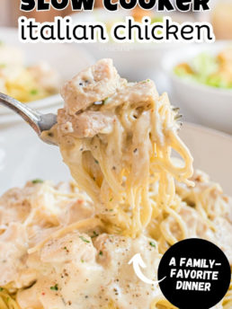 creamy Italian chicken on a fork with pasta noodles