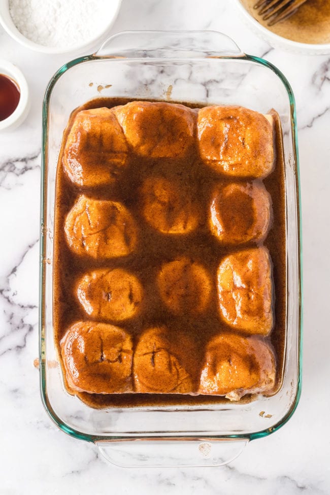 Hawaiian rolls covered in cinnamon and sugar butter for an easy cinnamon roll hack