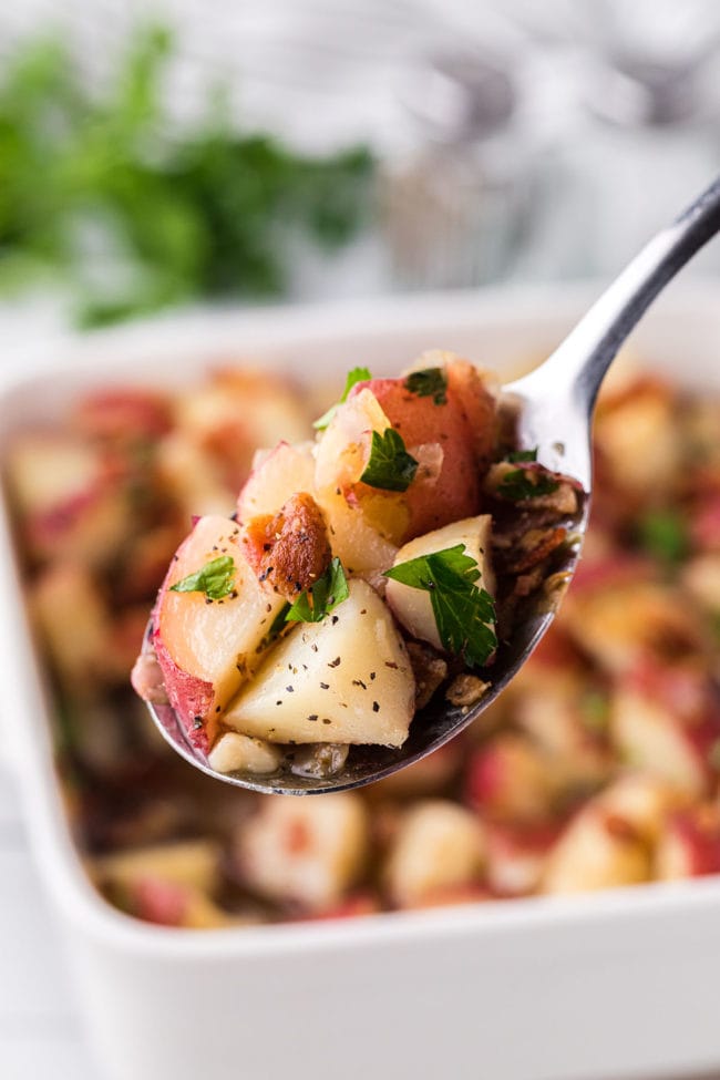 potato salad on a serving spoon