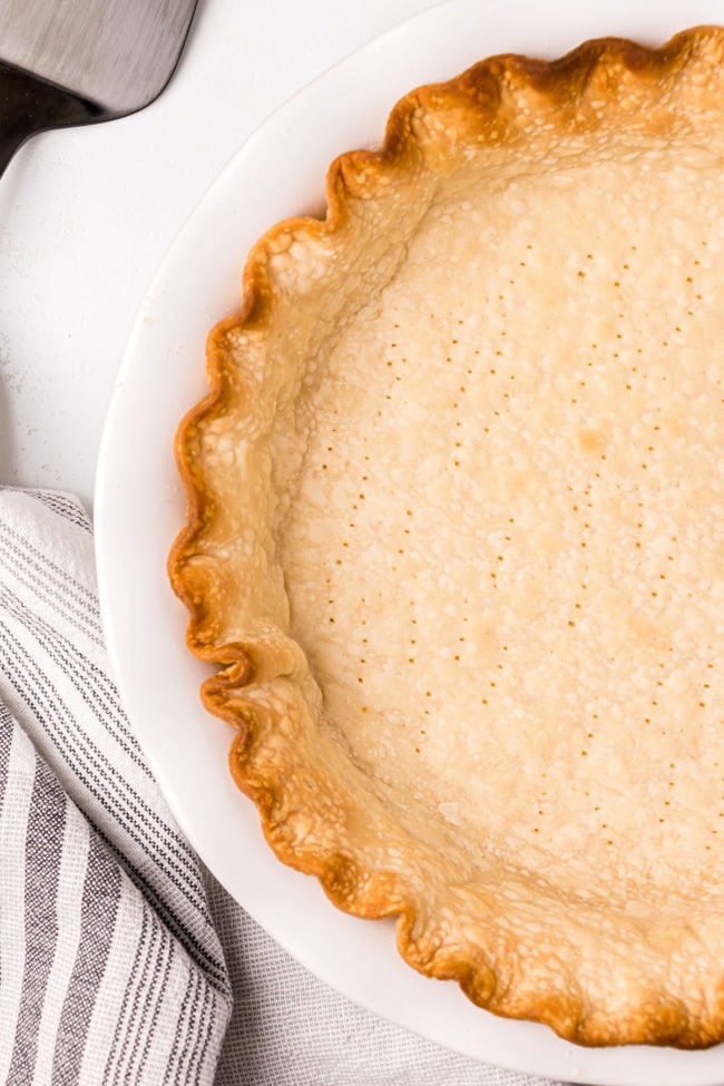 baked pie crust in a white dish
