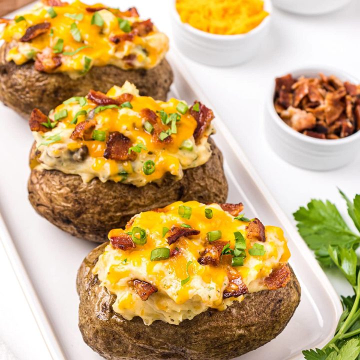 tray of baked potato skins with cheese and bacon